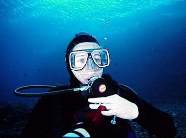Putting Ring on Suzanne's Finger Underwater in Fiji